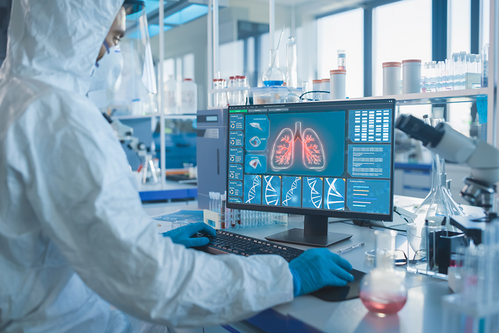 The screen displays a high-tech concept for researching polluted air in the lungs.