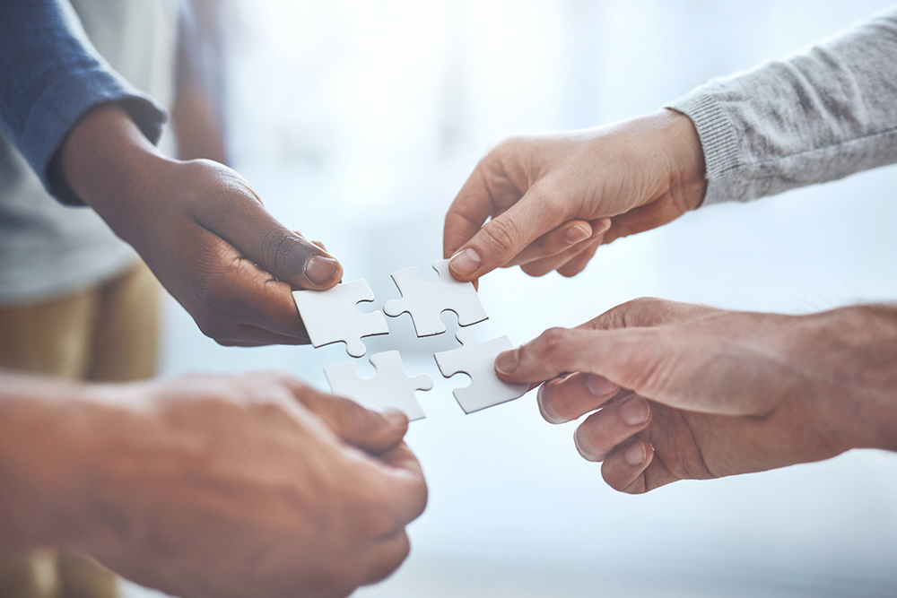 Concept of collaboration and teamwork to unite a common vision.