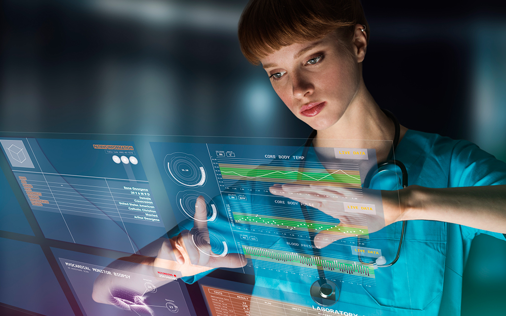 Doctor using innovative technology to monitor patient data in real time.